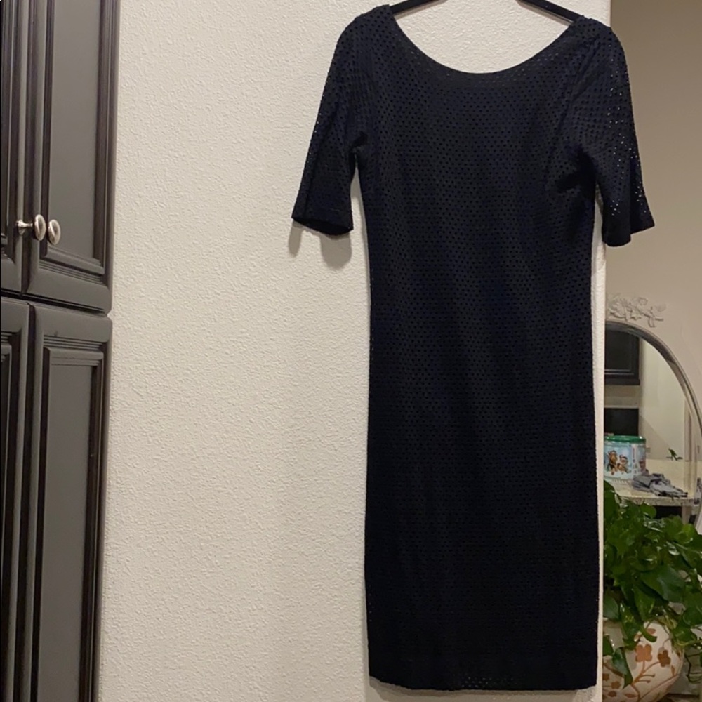 Two layer dress with small holes as a nice touch